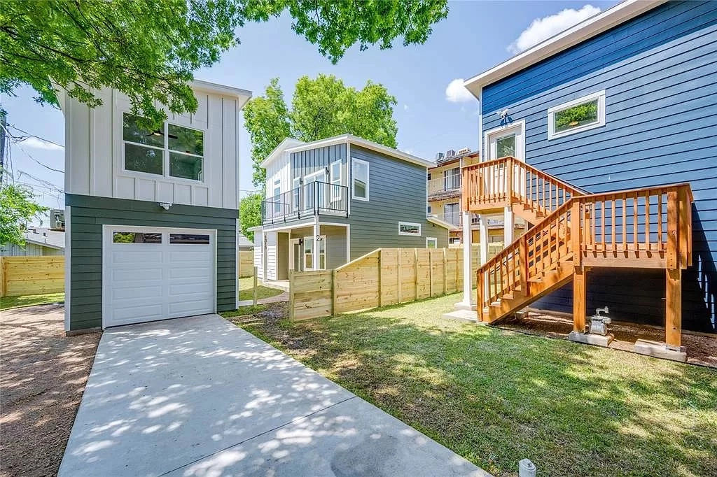 Clearfield ADU and garage apartment positioned behind an existing Austin home with driveway and yard access